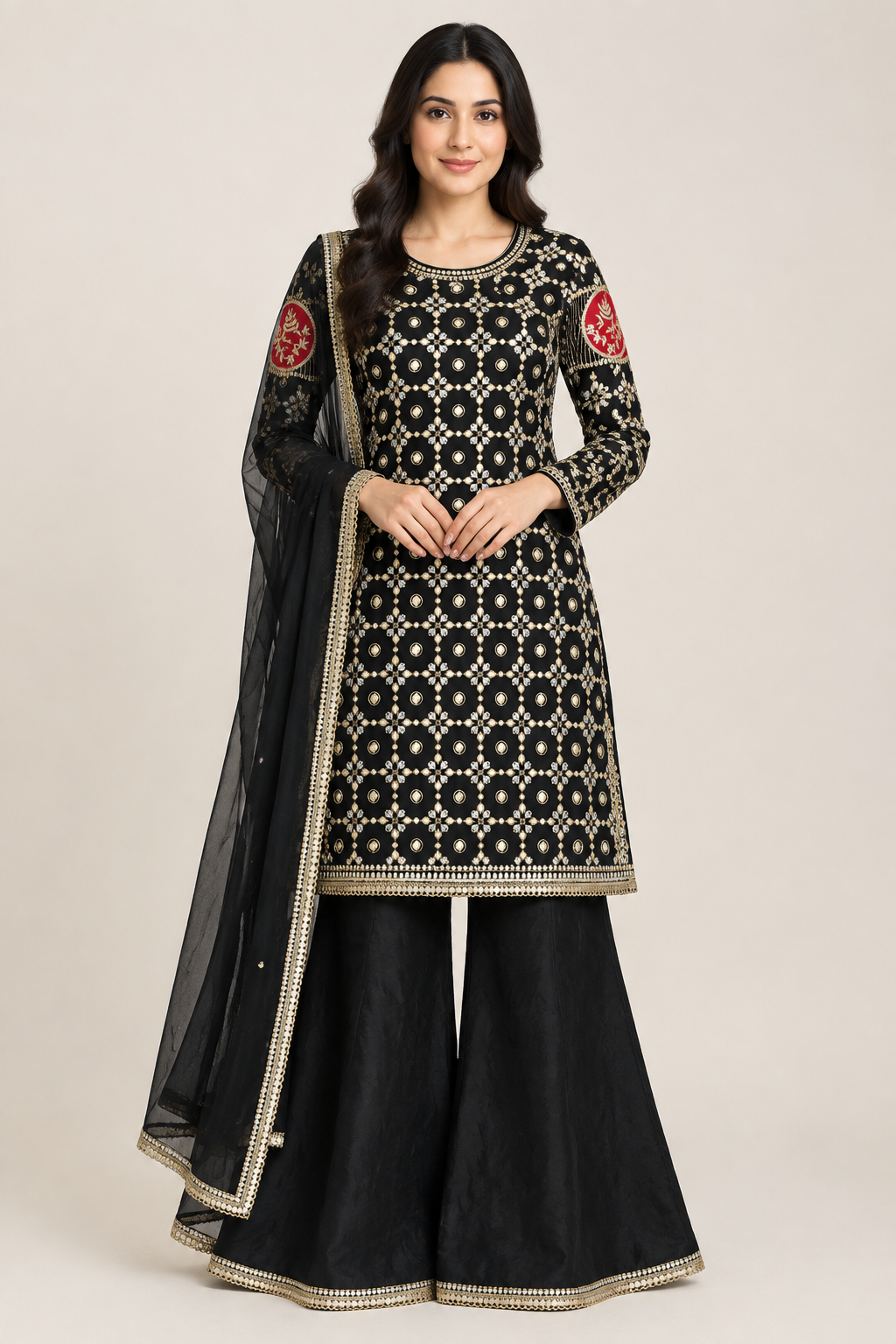 Model wearing the black embroidered outfit