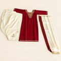 Red and cream outfit on an ivory background