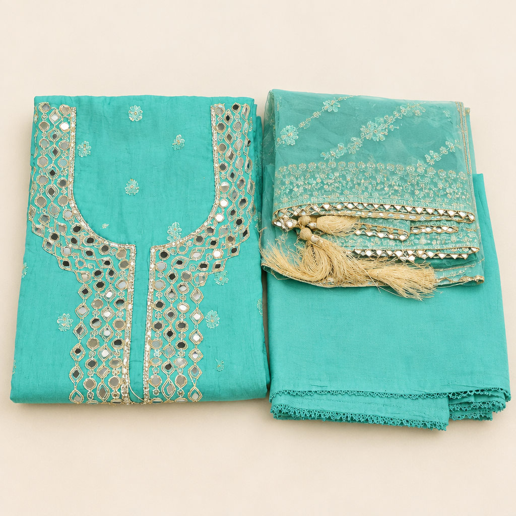 Sea-green suit on an ivory background